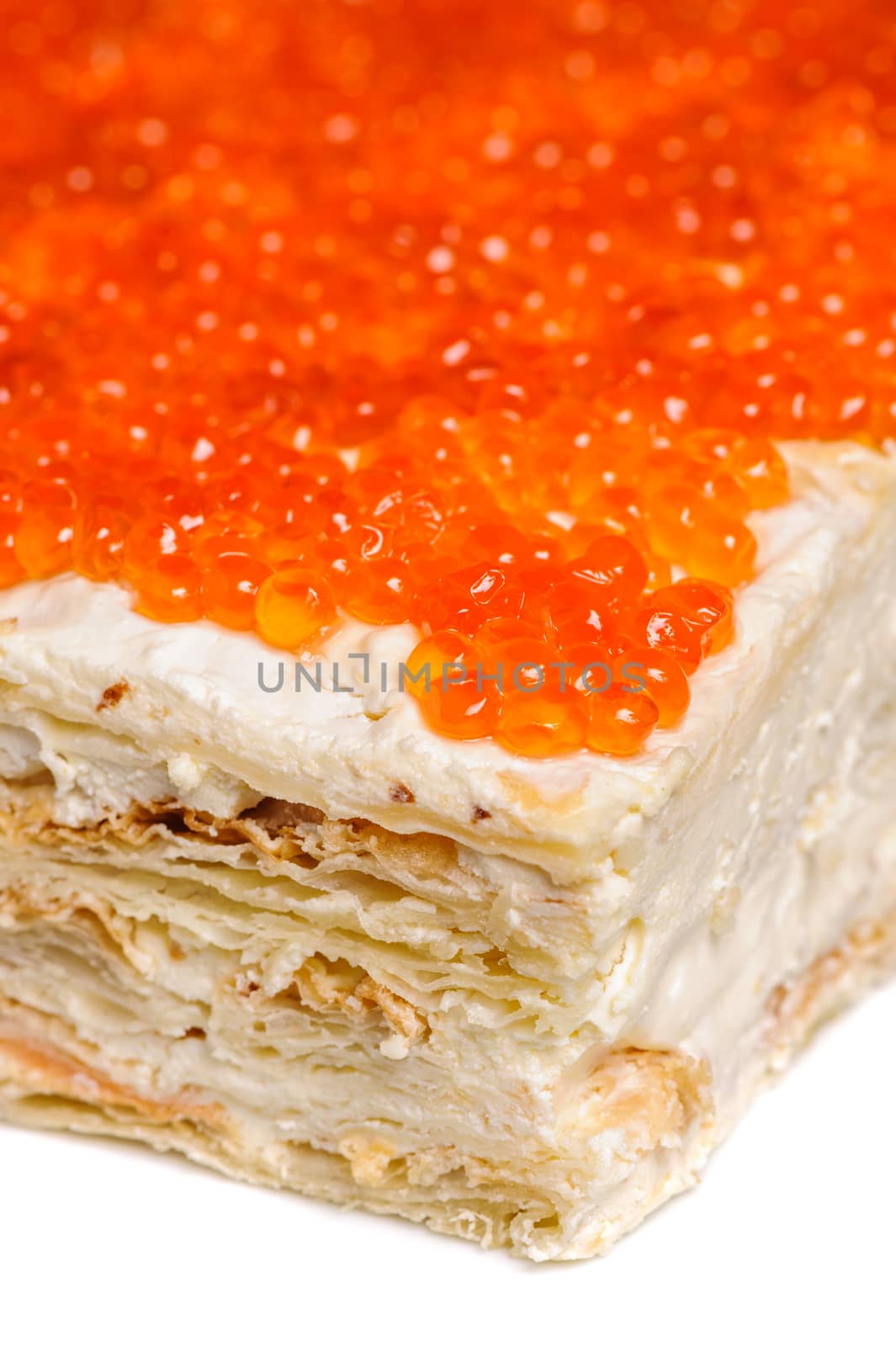 closeup of layered pie made with red caviar