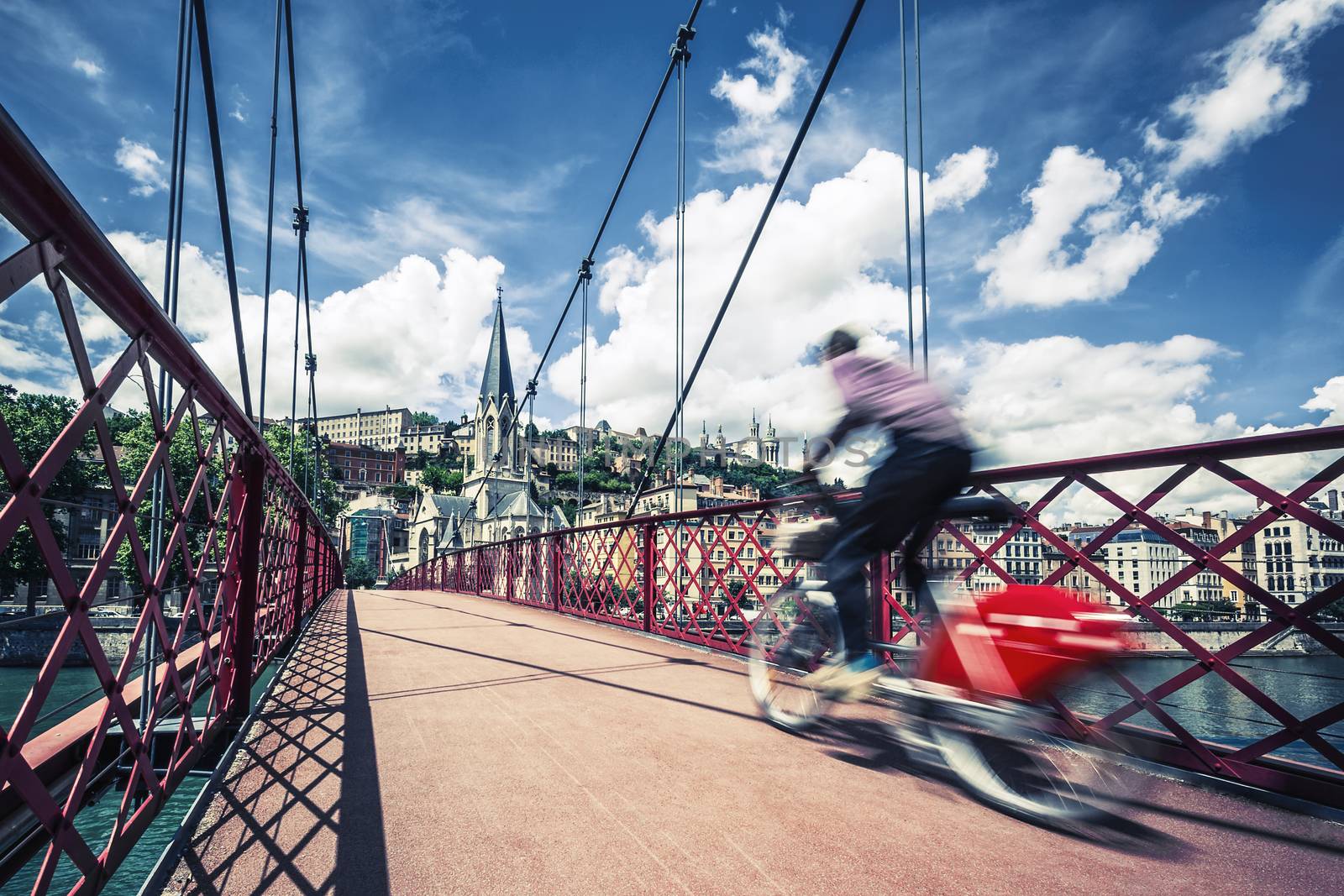 Bike on red footbridge, Lyon, France