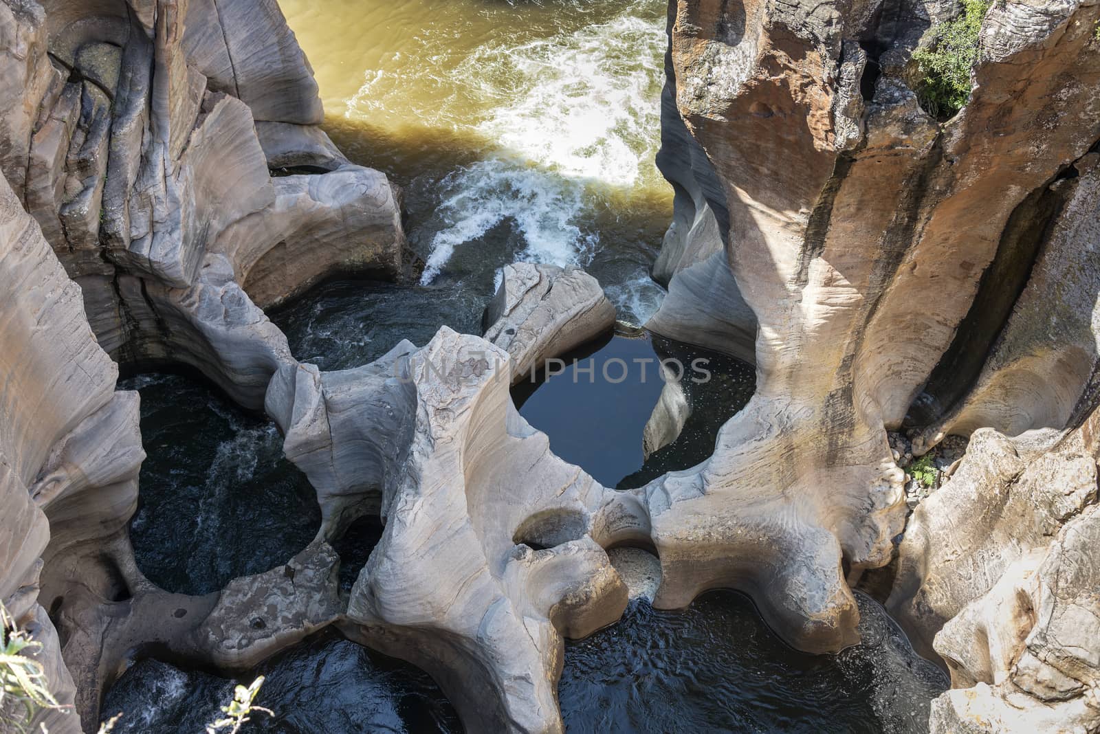 river at the bourkes potholes in south africa near the panoramaroute with big canyon and waterfalls