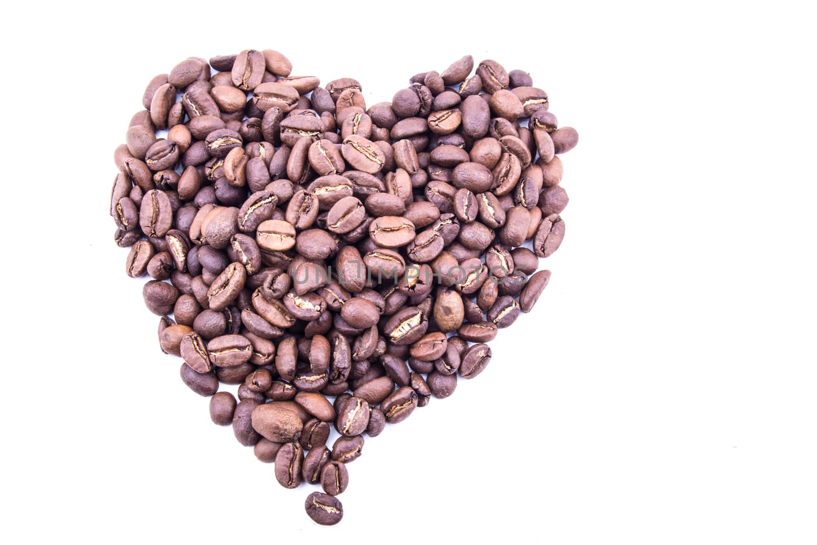 the pile of hearth coffee bean on the white background
