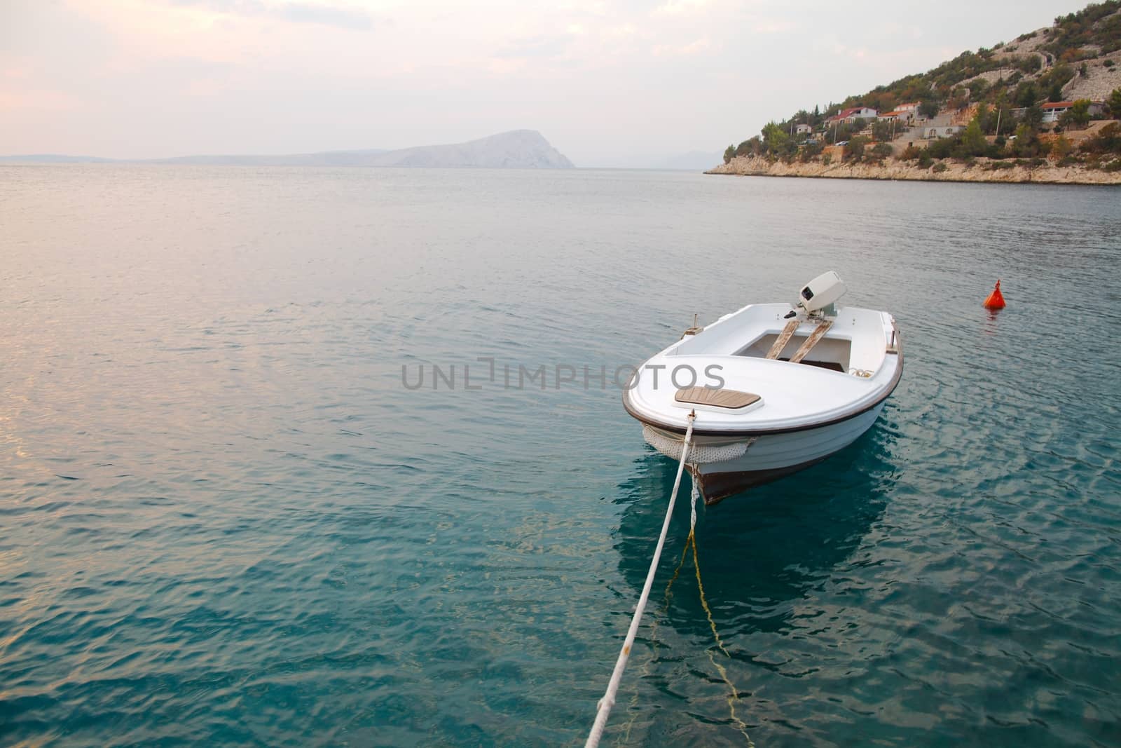 Boat in a bay by Gudella
