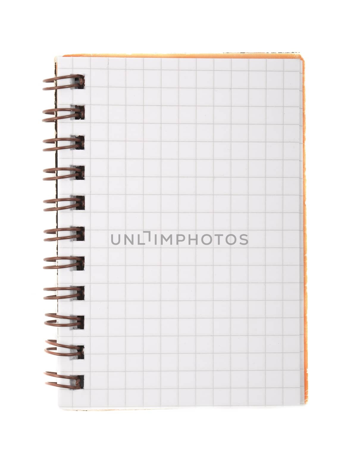 Notebook with square grid on a table
