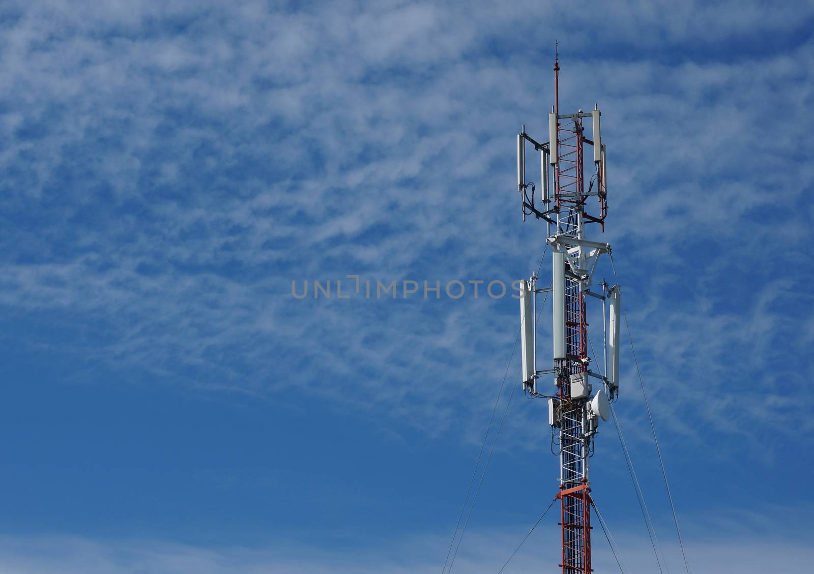 Teleommunications antennas with blue sky background  by ninun