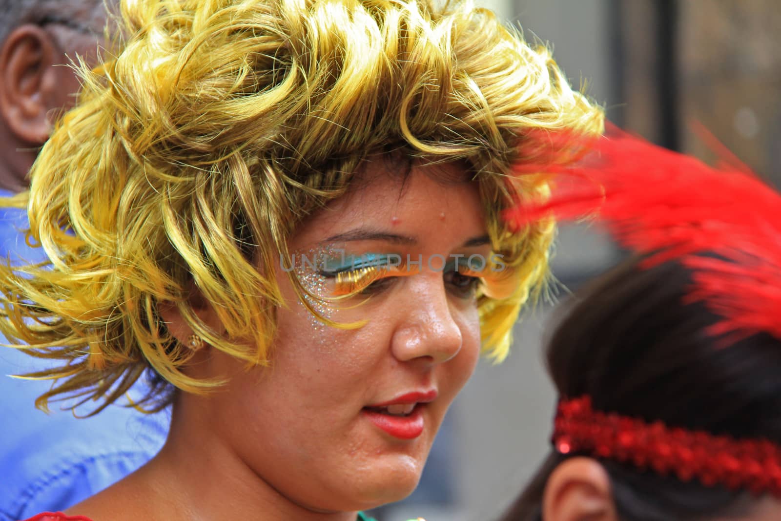 A woman partying on a street in Rio de Janeiro, Brazil 01 Mar 2014 No model release Editorial only