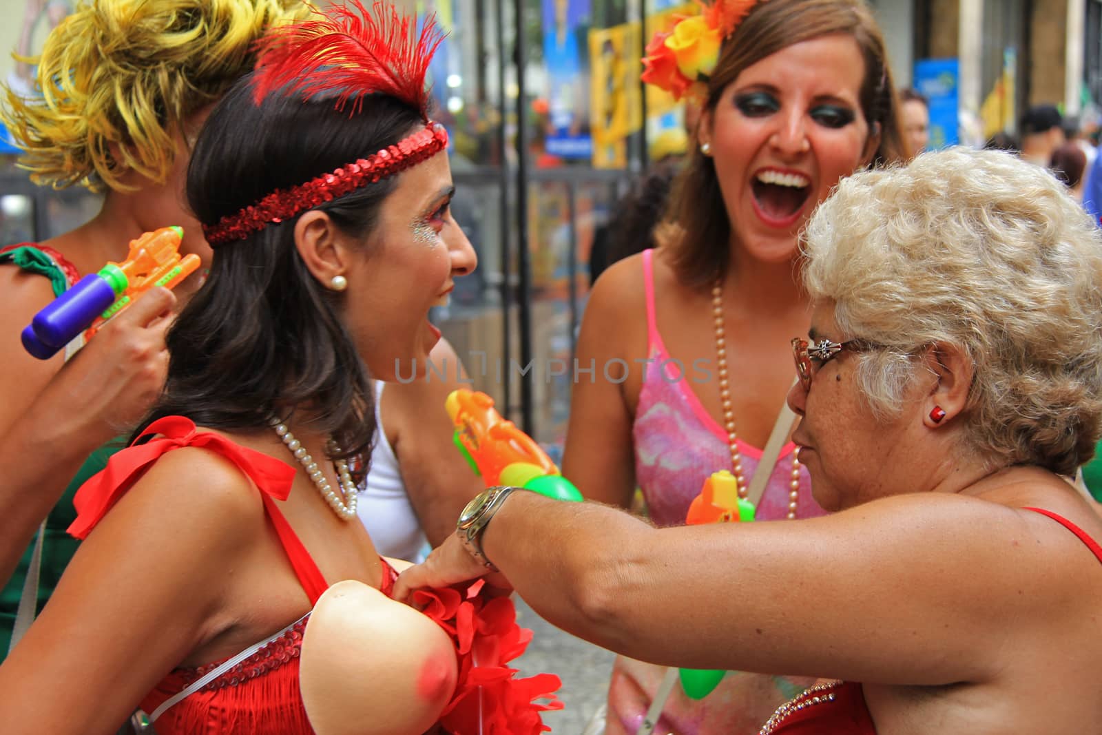 Women partying on a street in Rio de Janeiro, Brazil 01 Mar 2014 No model release Editorial only