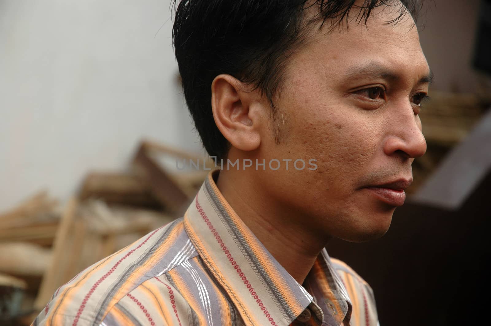 cikijing, west java, indonesia - july 10, 2011: man wearing casual shirt