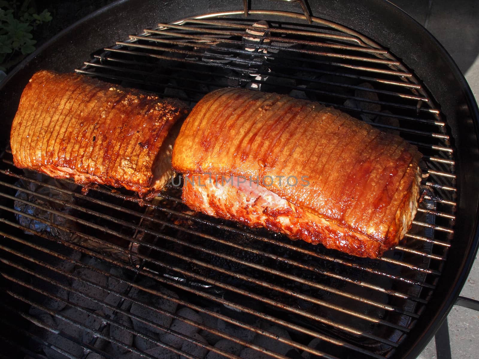 Tasty grilled pork on hot charcoal grill BBQ    