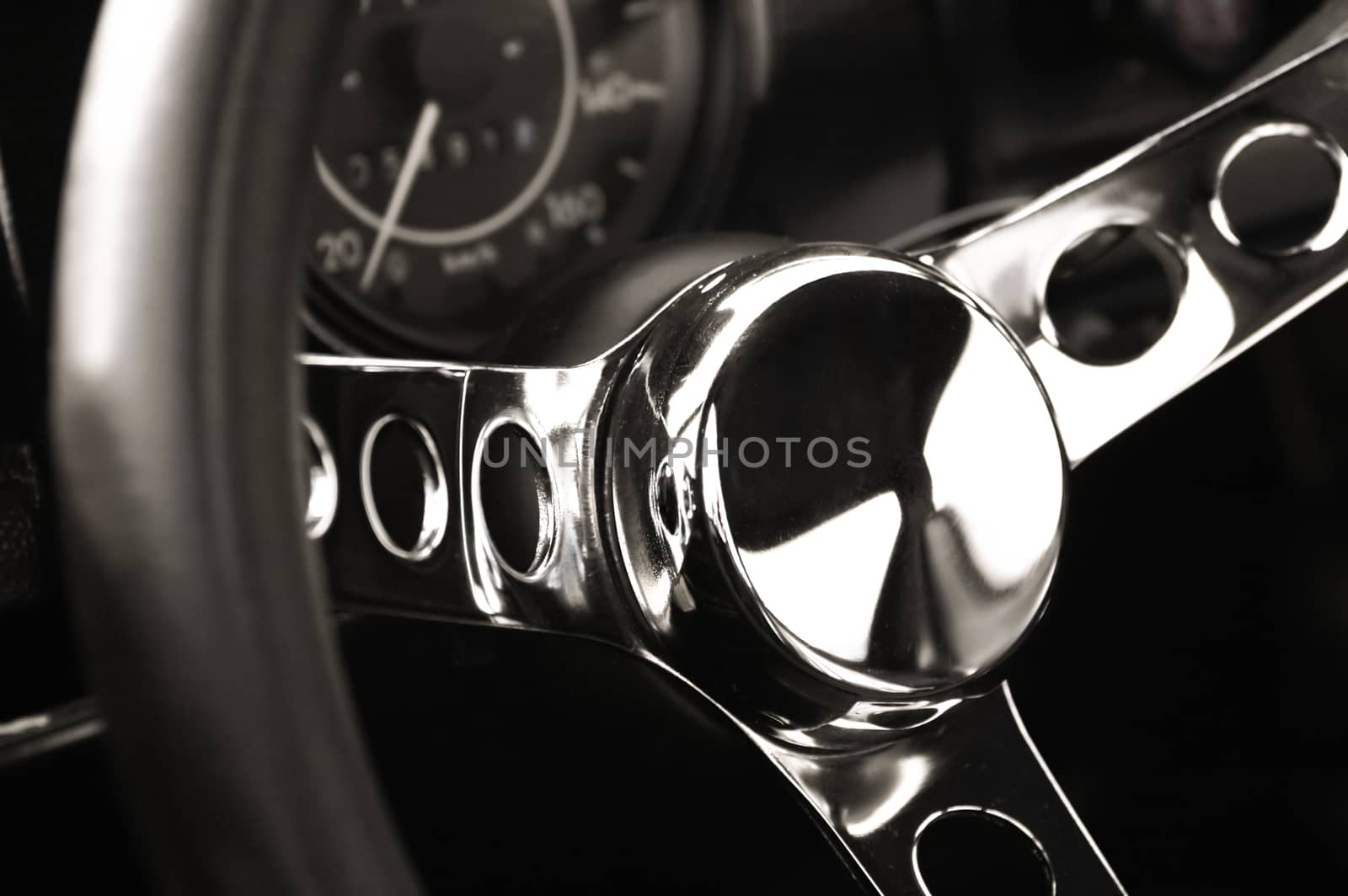 luxury chromed steering wheel from sports car