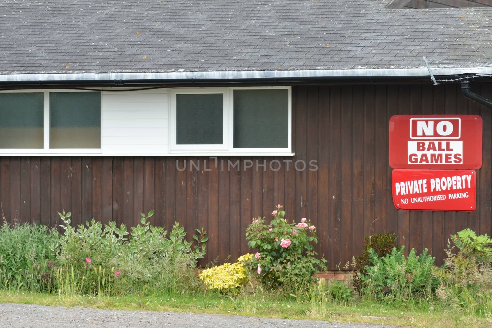 No ball games sign on shed