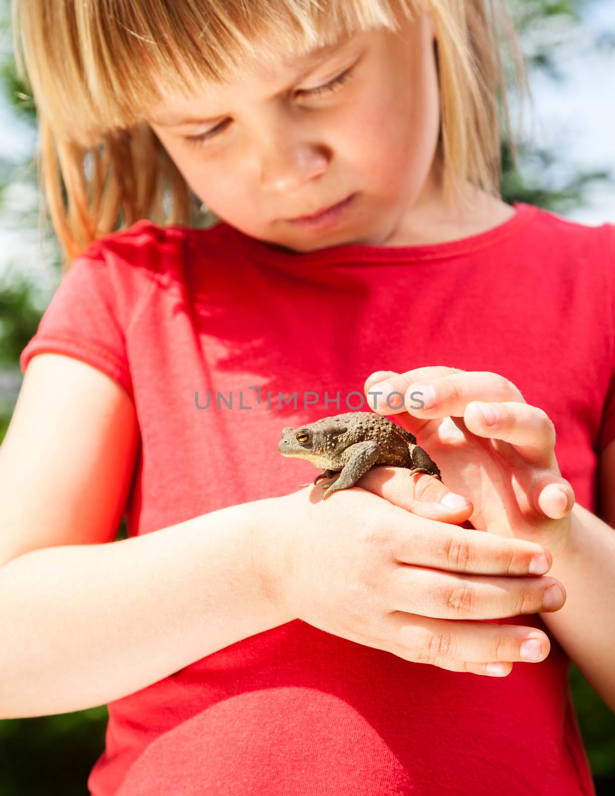 Child with frog by naumoid
