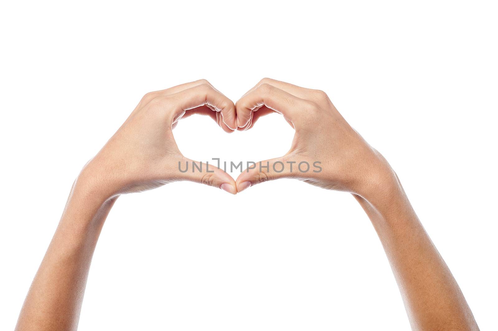Woman hands making heart sign