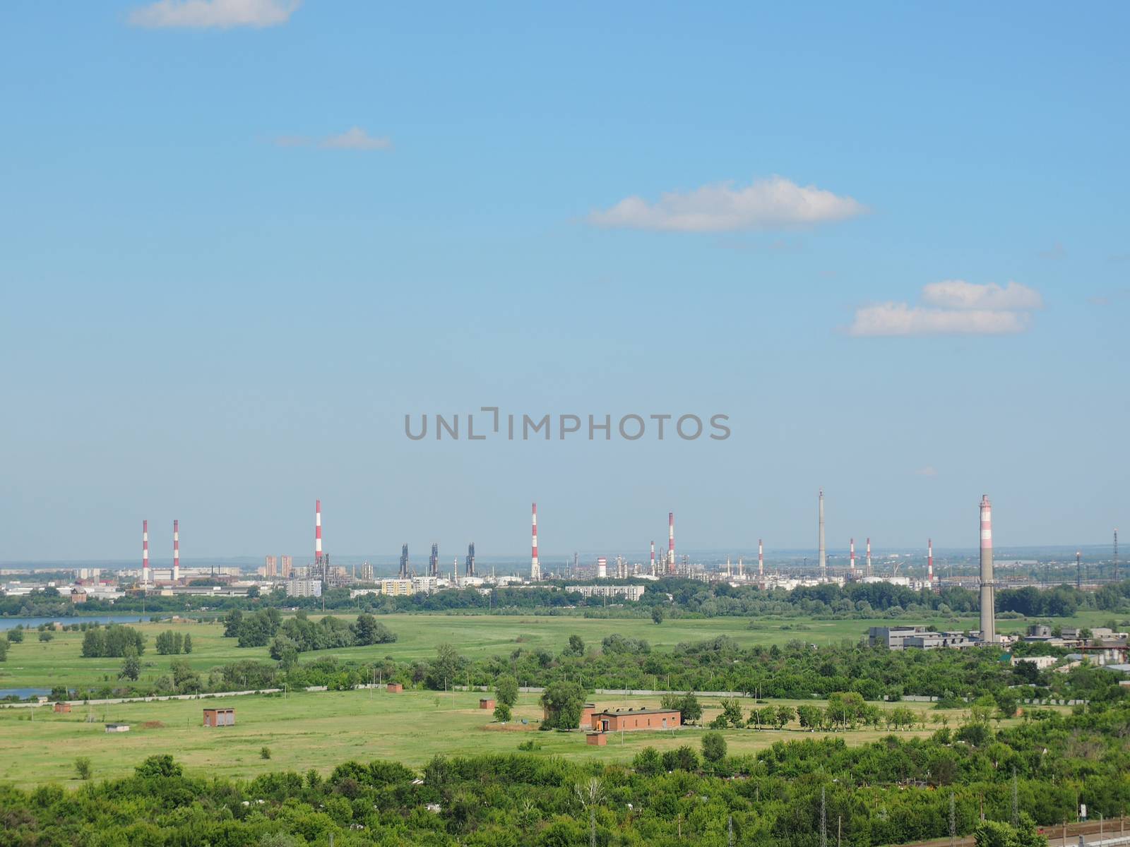 oil refinery with pipes sticking out  by butenkow