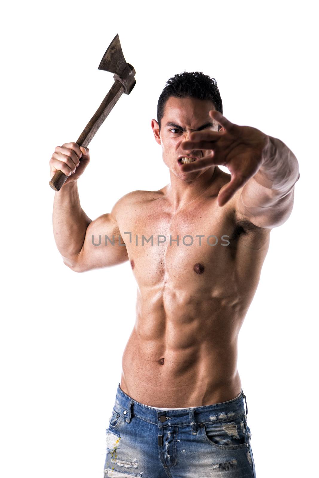 Aggressive, violent muscular young man shirtless, holding axe in his hand, isolated on white