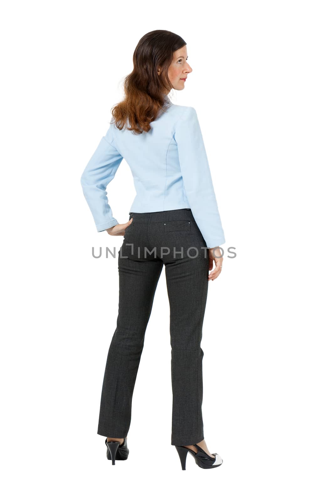 Young woman standing with his back on a white background