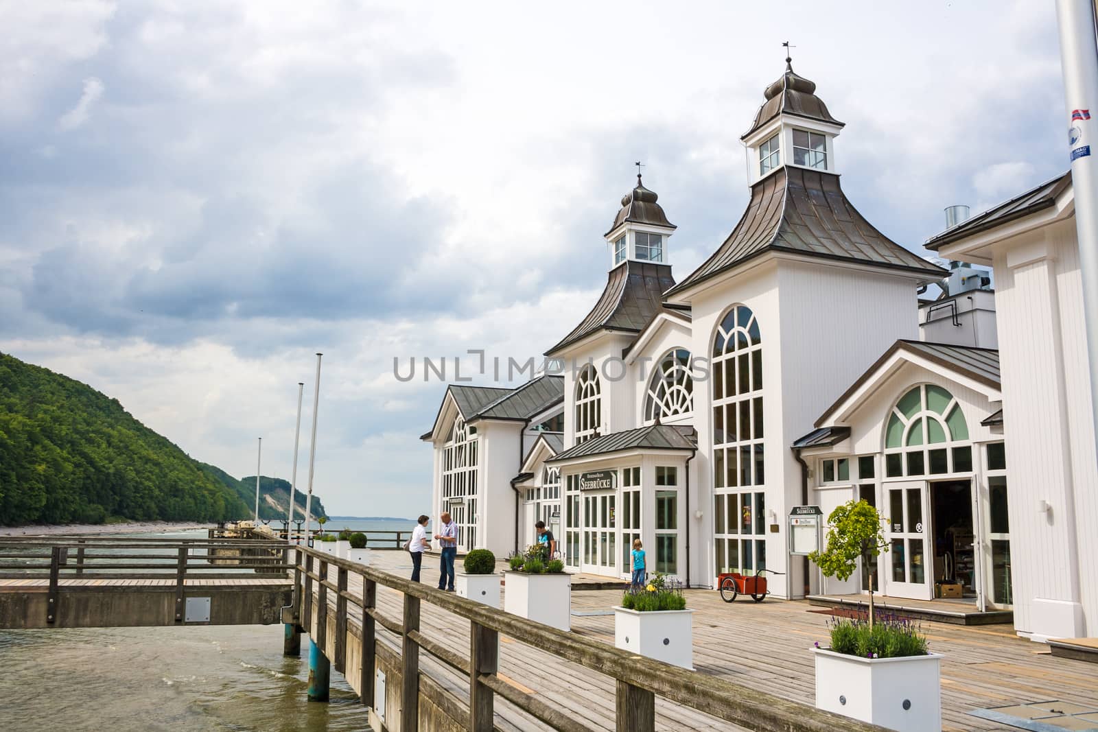 Sellin, Germany - June 23, 2012: Pier with historical house. A famous tourist attraction on the island of R�gen.