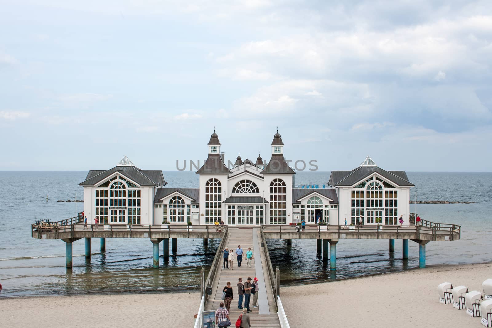Sellin, Germany - June 23, 2012: Pier with historical house. A famous tourist attraction on the island of R�gen.