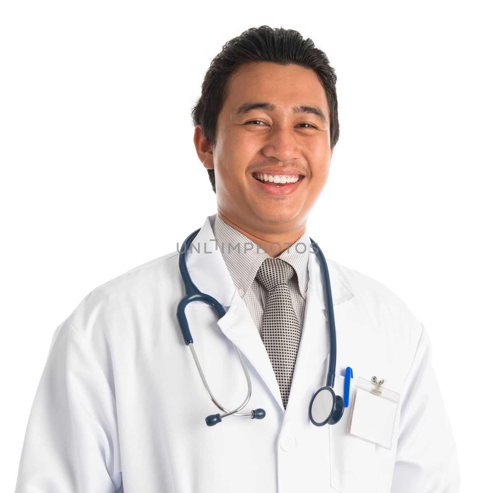 Portrait of handsome southeast Asian male medical doctor smiling, standing isolated on white background. Young man model.
