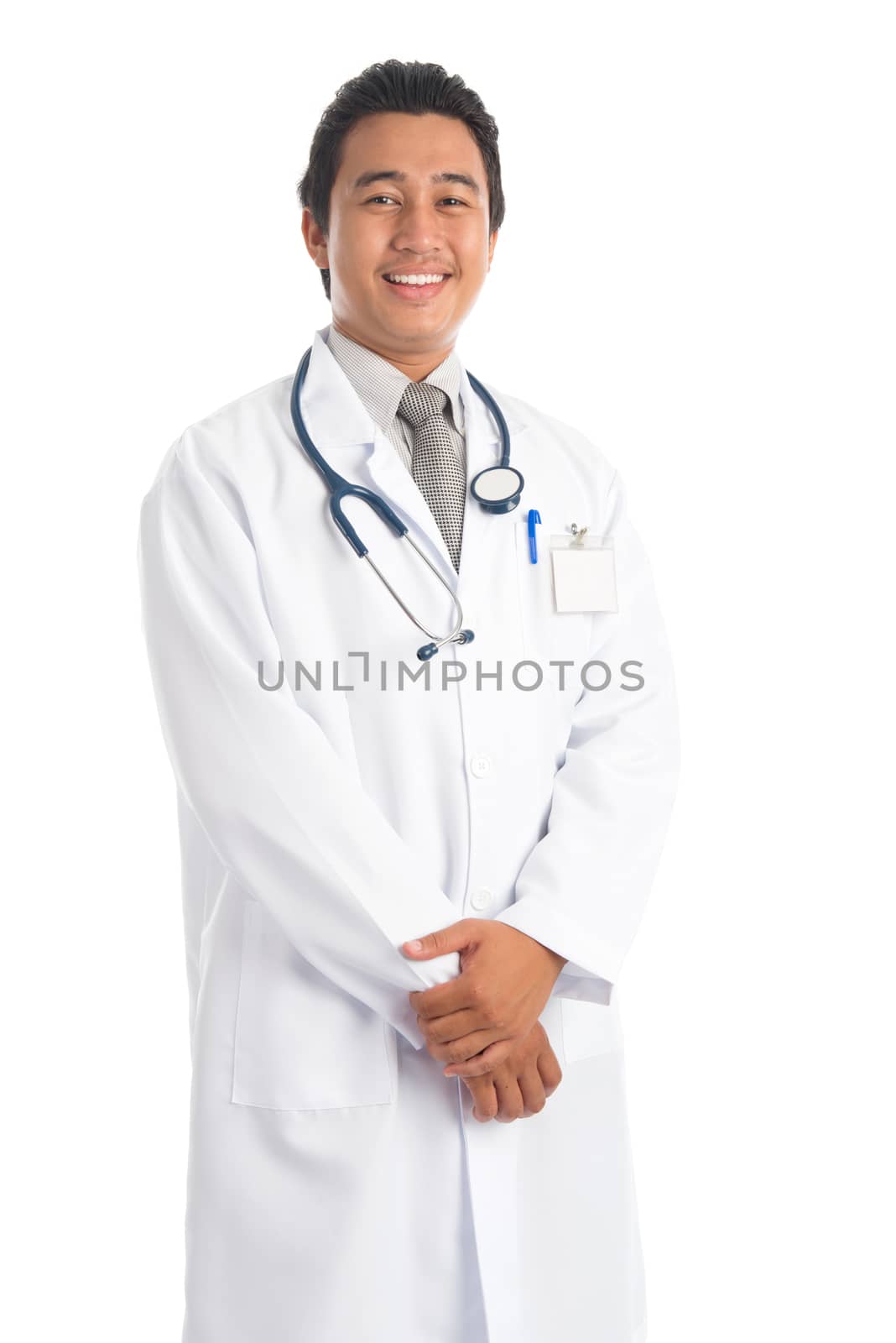 Portrait of southeast Asian medical male doctor smiling, standing isolated on white background. Young man model.