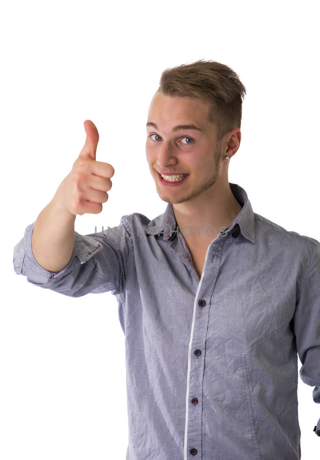 Handsome blond young man doing thumb up sign, isolated on white