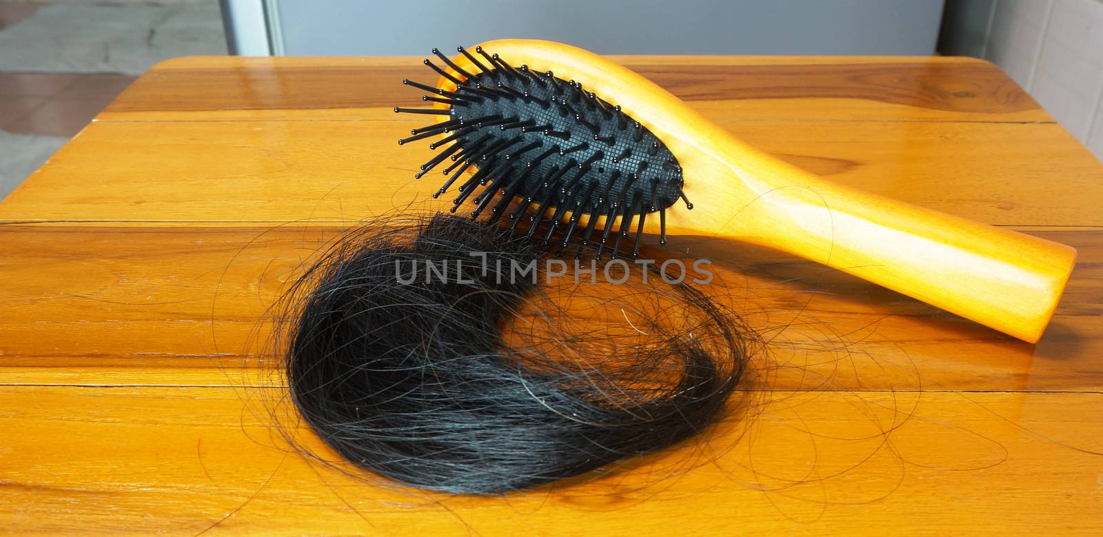 Hair loss in patients receiving chemotherapy, after using hair combs.                               