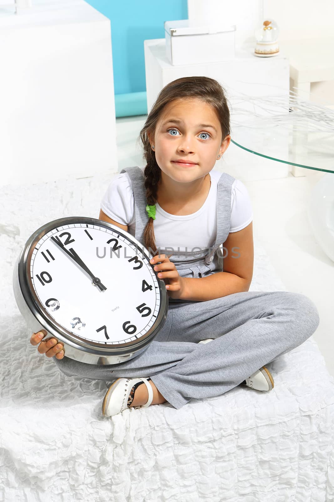 Girl with a big clock
