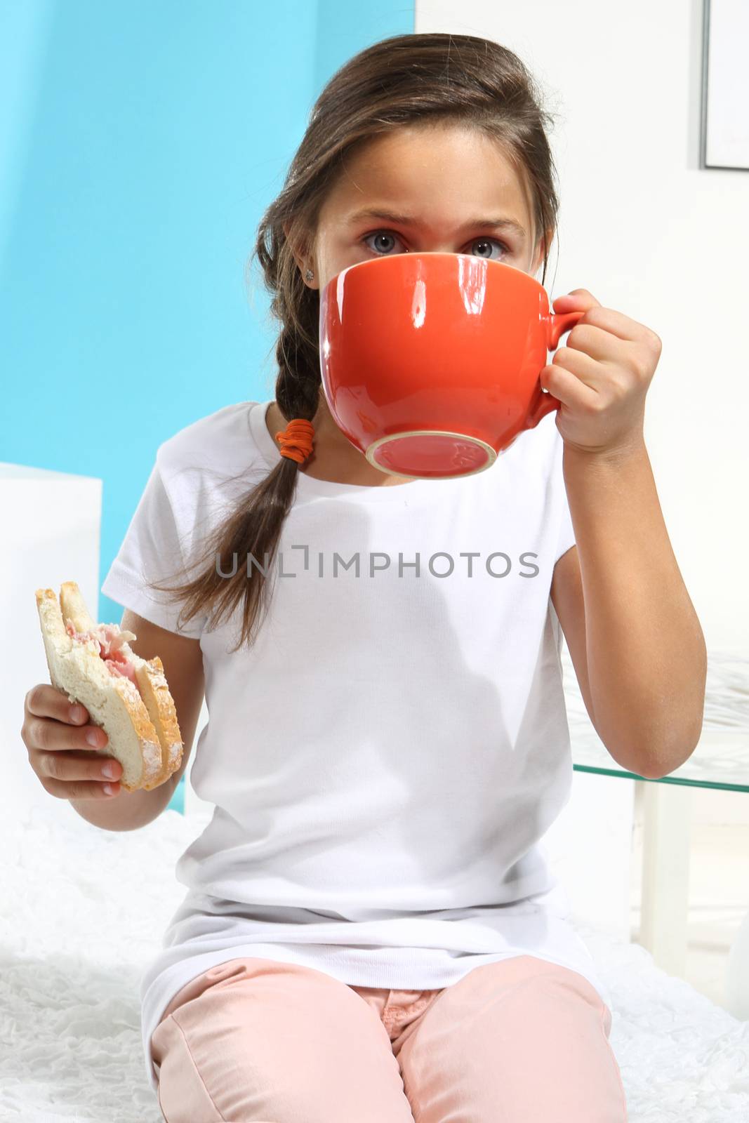 The girl has breakfast by robert_przybysz