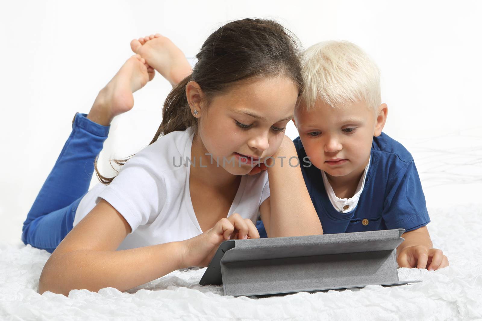 Children look tablet