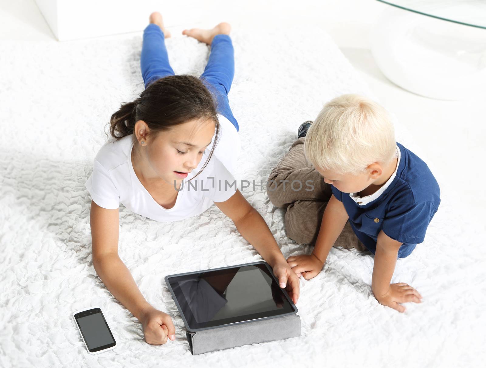 Children look tablet