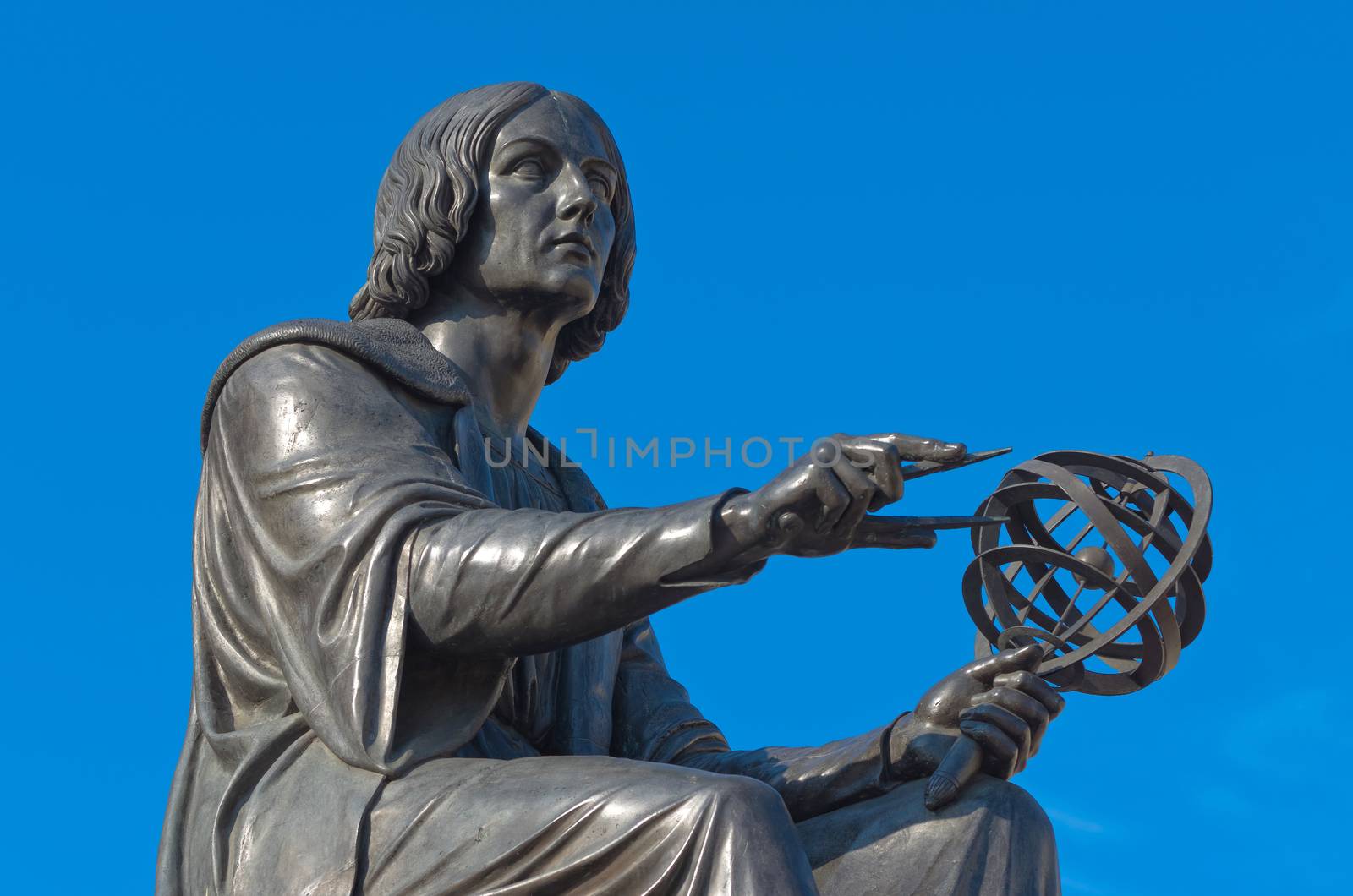 Close-up of the bronze statue of astronomer Nicolas Copernicus by Bertel Thorvaldsen, 1830, Warsaw, Poland.