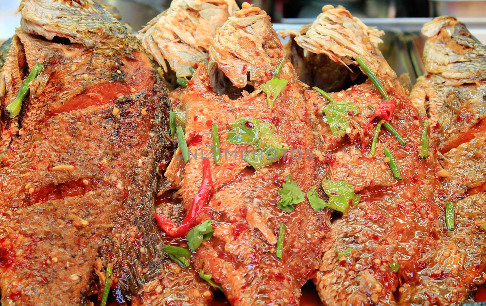 Fried fish spicy with herb and tamarind sauce