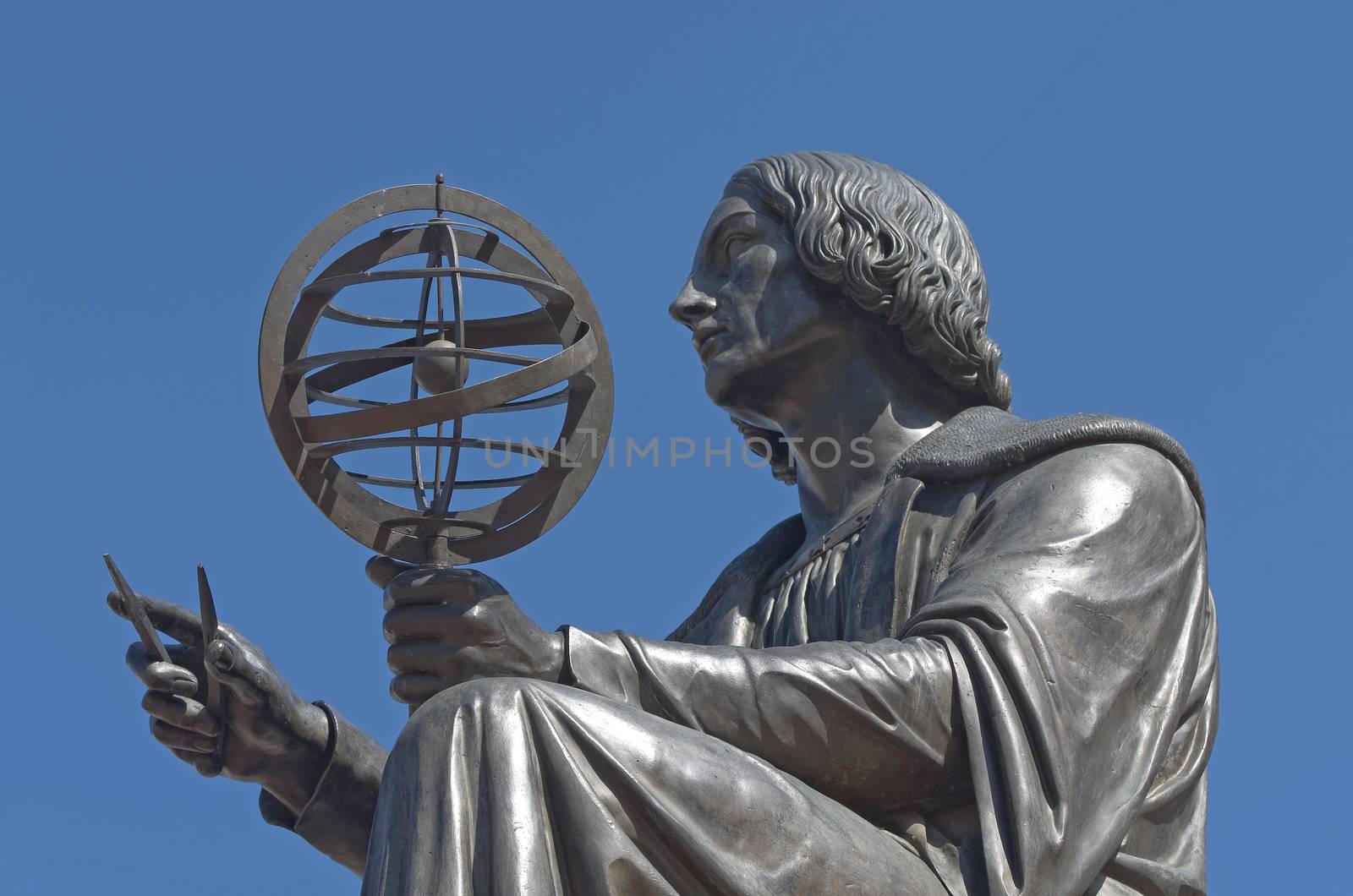 Close-up of the bronze statue of astronomer Nicolas Copernicus by Bertel Thorvaldsen, 1830, Warsaw, Poland.