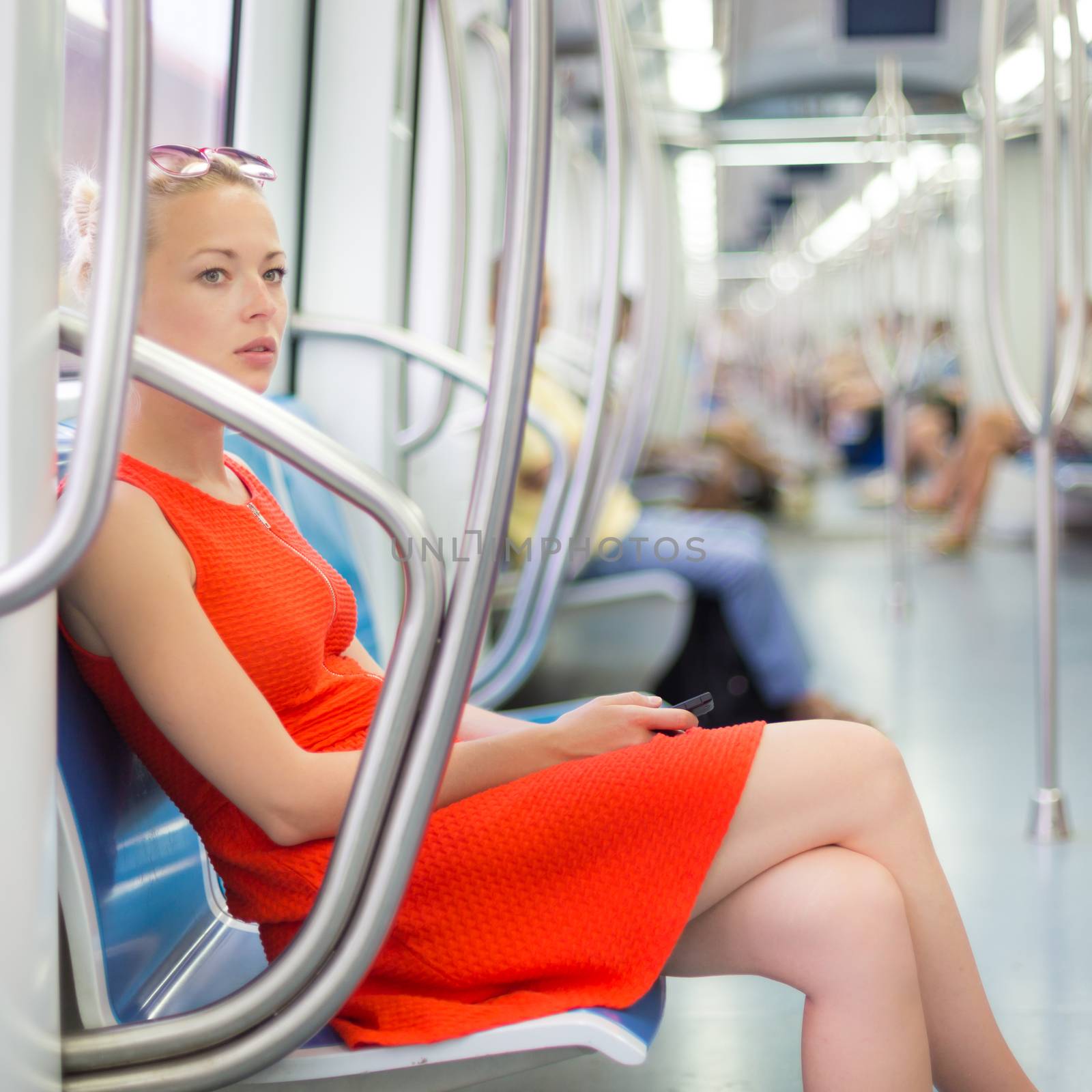 Lady traveling by metro. by kasto
