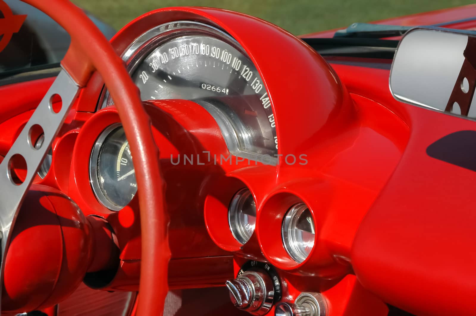 bright red dashboard from a classic car