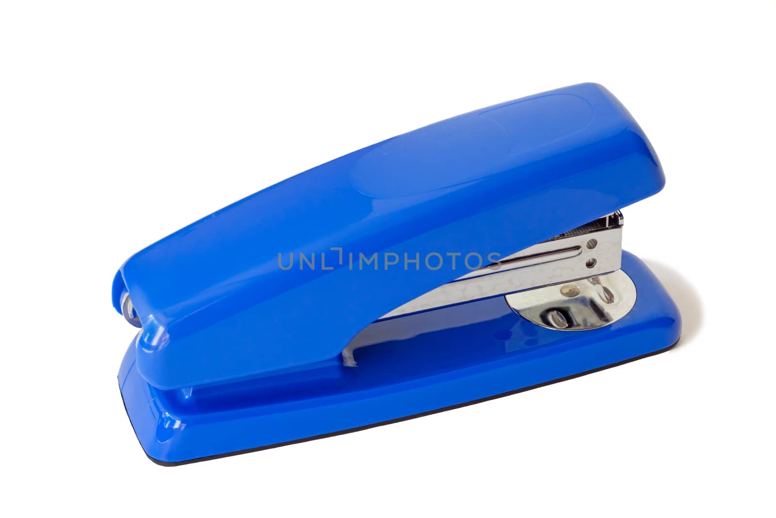 The bright blue stapler for papers, is photographed by a close up.