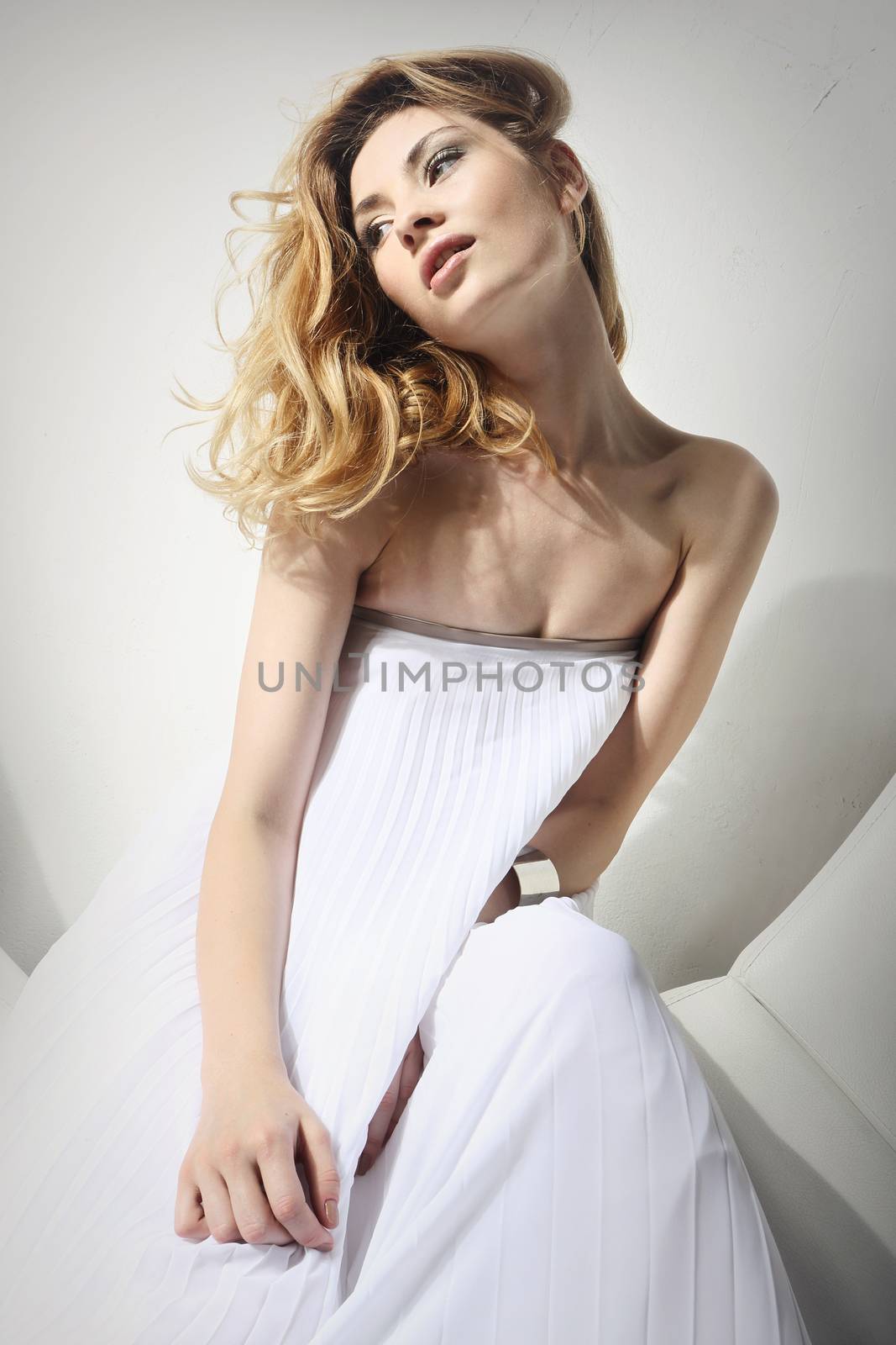 Beautiful lady in a white gauzy dress