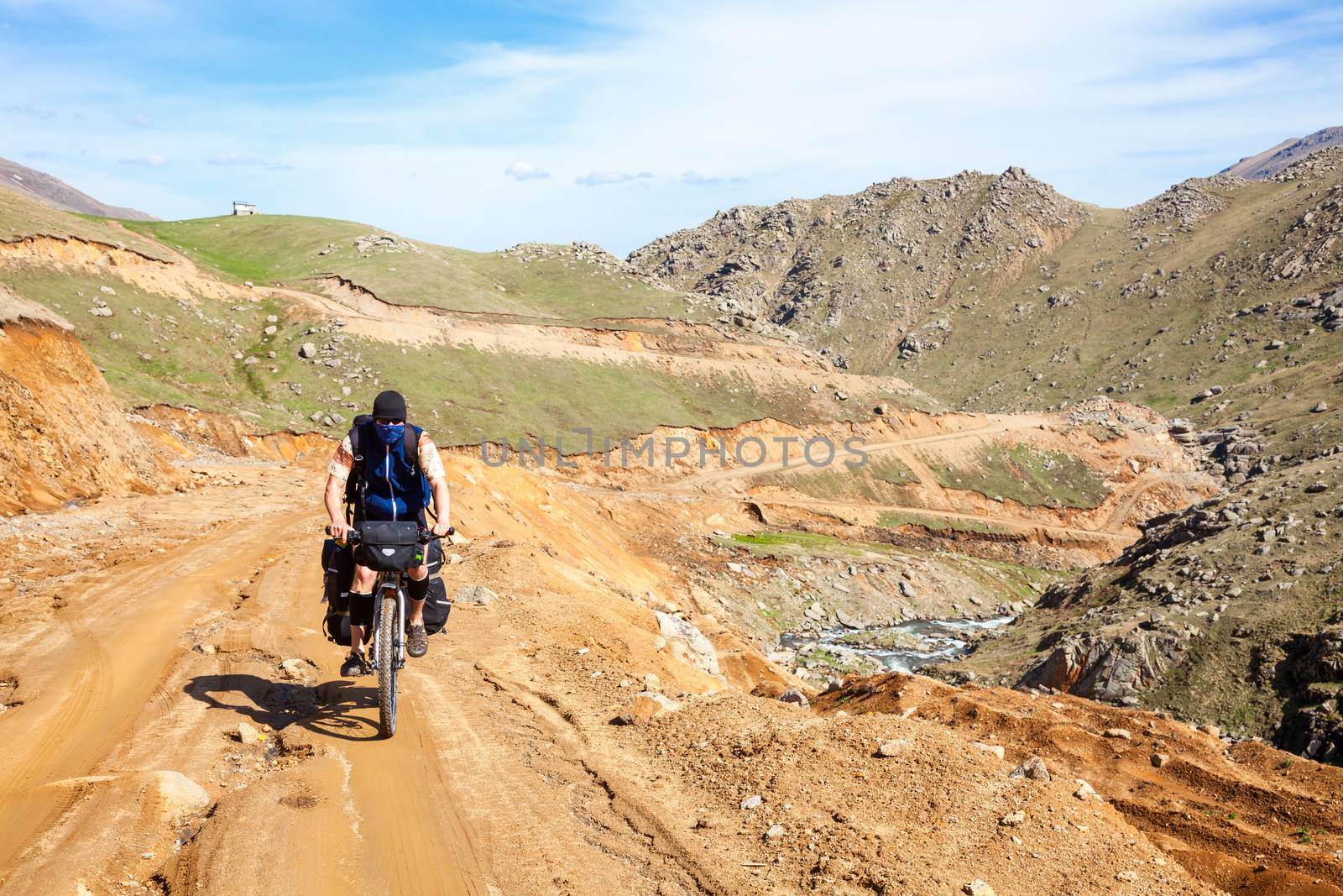 Travelling cyclist in Pontic Alps by naumoid