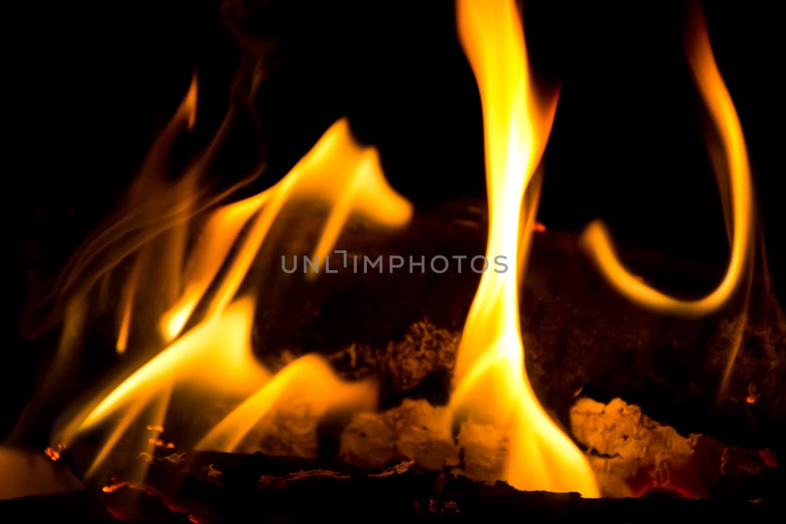 Photo with red flame on black background