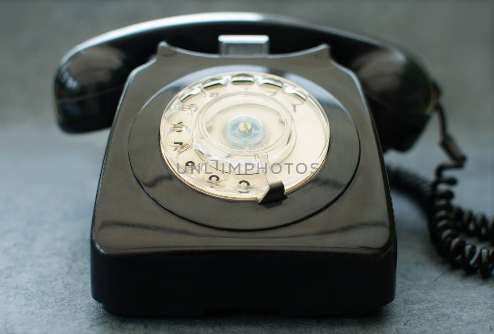 Old black vintage telephone close up
