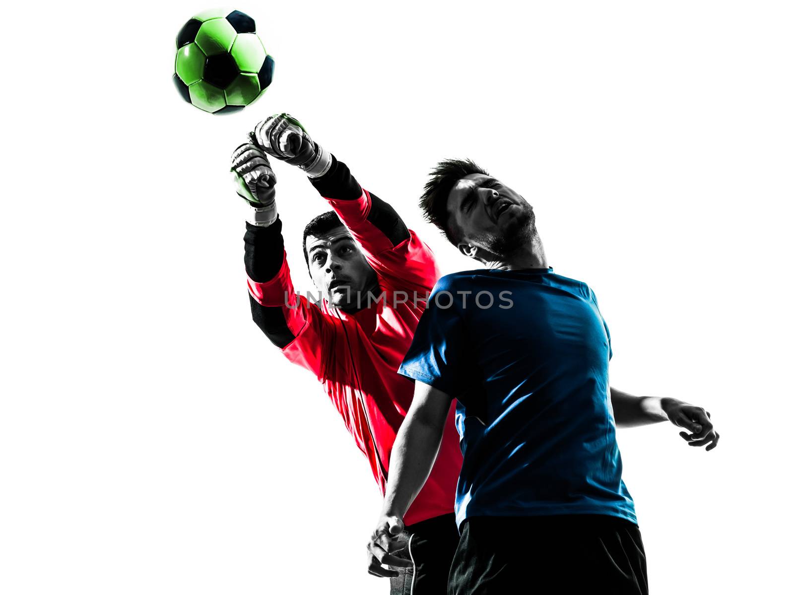two caucasian soccer player goalkeeper men punching heading ball competition in silhouette isolated white background