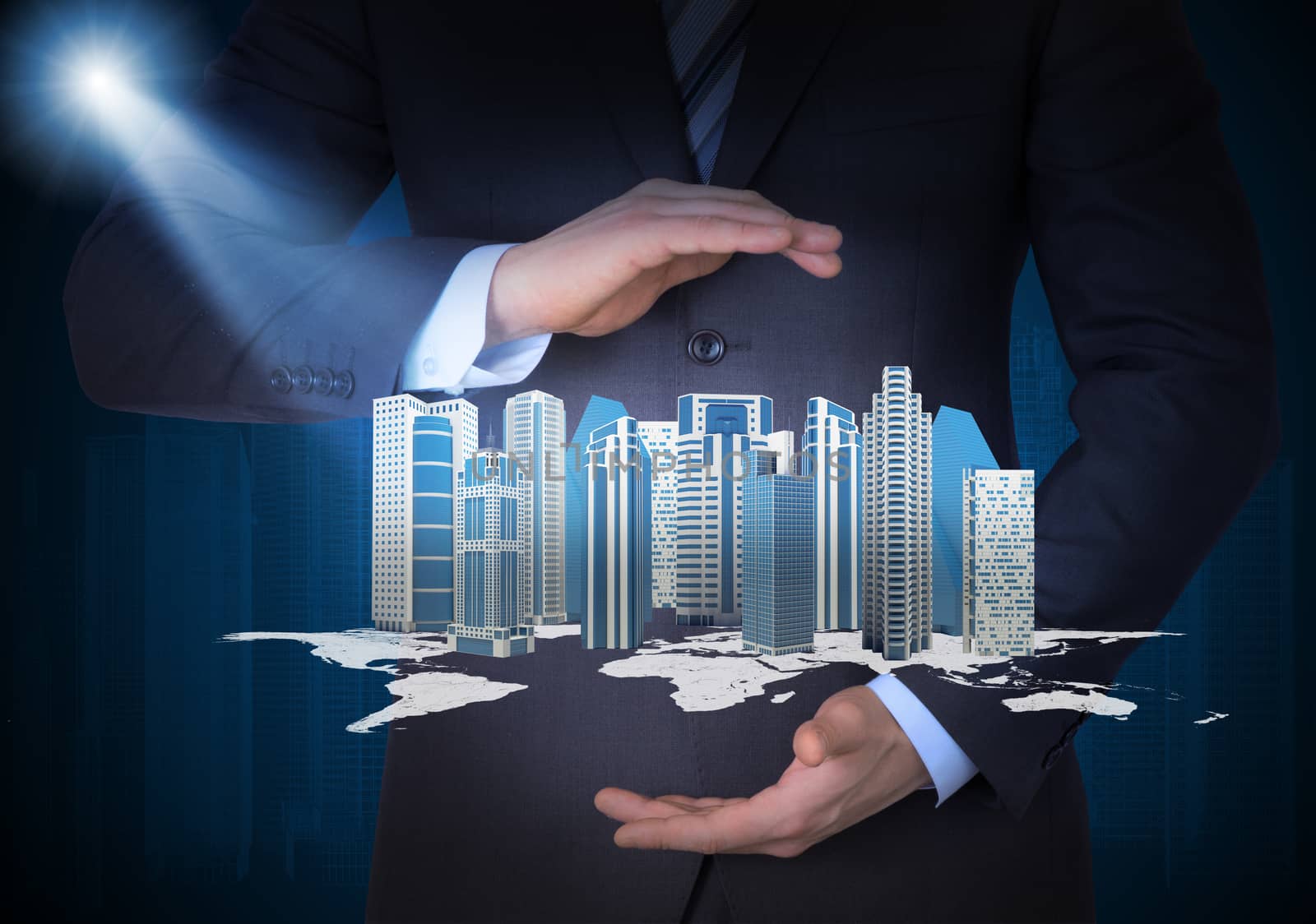 Man in suit holding city of skyscrapers in the hand. Spotlight shines skyscrapers