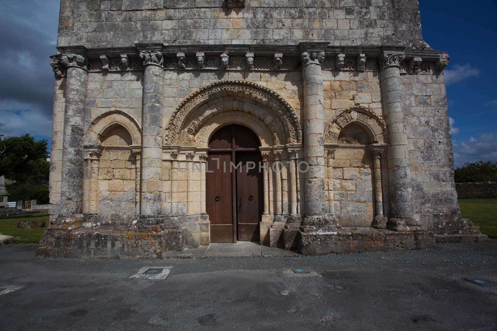 facade main entrance of the romanesque Retaud church,Charente, France