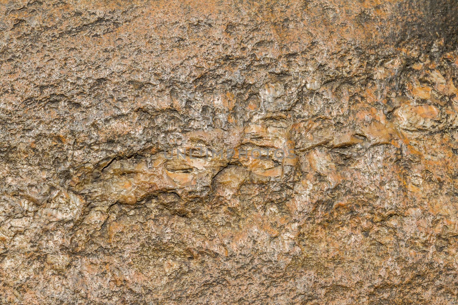 Texture of brown stone with rough surface