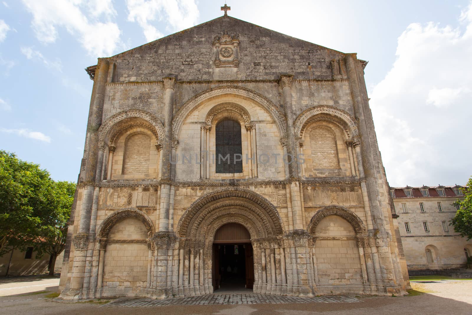 Full view of beautiful romanesque facade in Saintes Framce .Abbey aux Dames