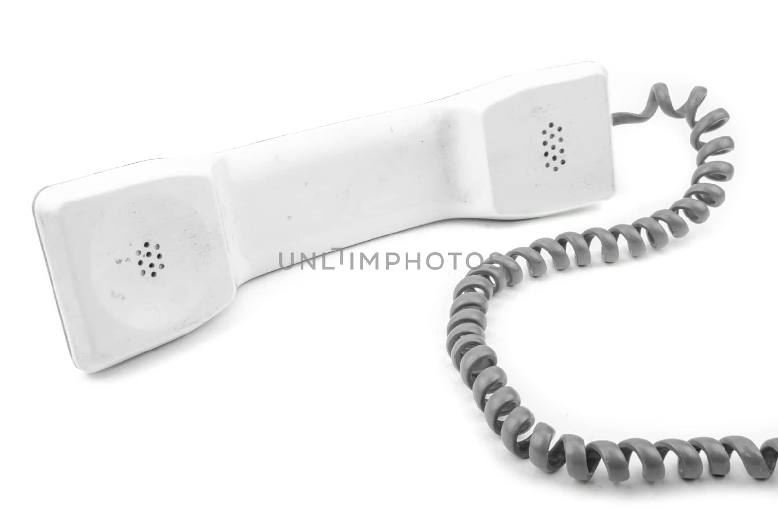 the beautiful vintage phone receiver put on the white background