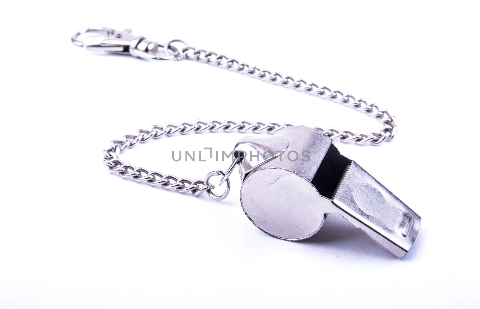 the beautiful world cup whistle with stainless steal ornamental chain
on the white background