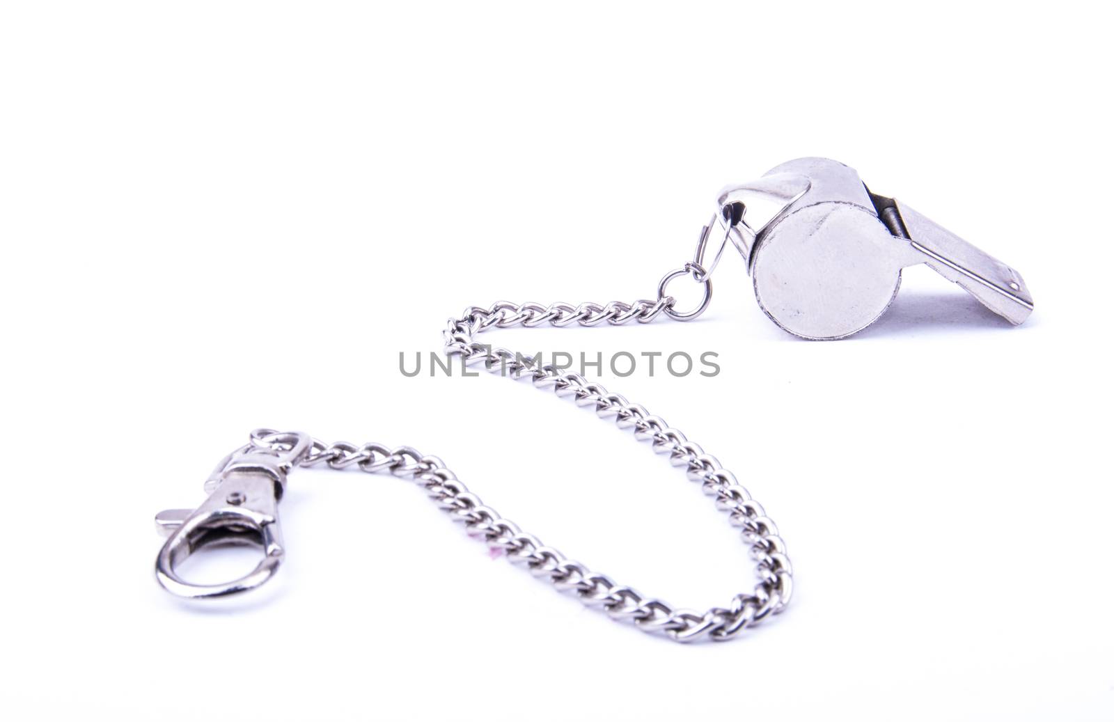 the beautiful world cup whistle with stainless steal ornamental chain
on the white background