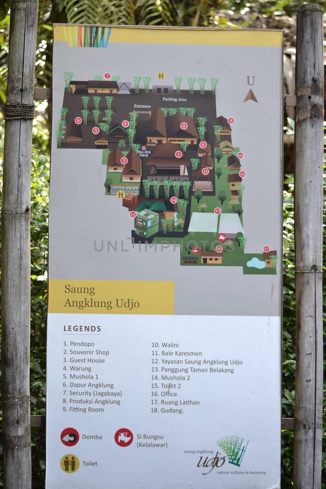 bandung, indonesia-june 16, 2014: saung angklung udjo area map sign displayed in front of main entrance gate.