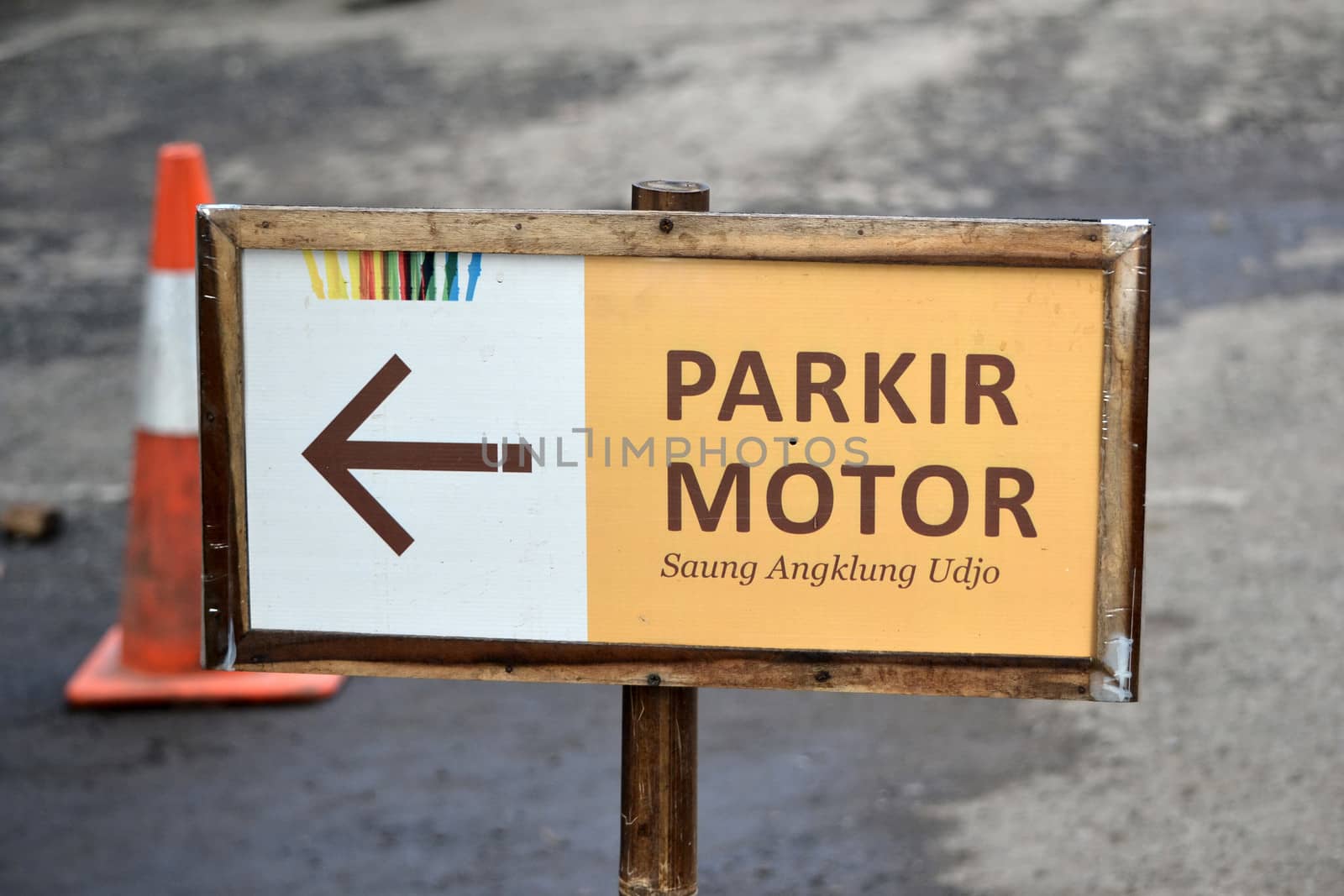 bandung, indonesia-june 16, 2014: saung angklung udjo motorcycle parking sign.