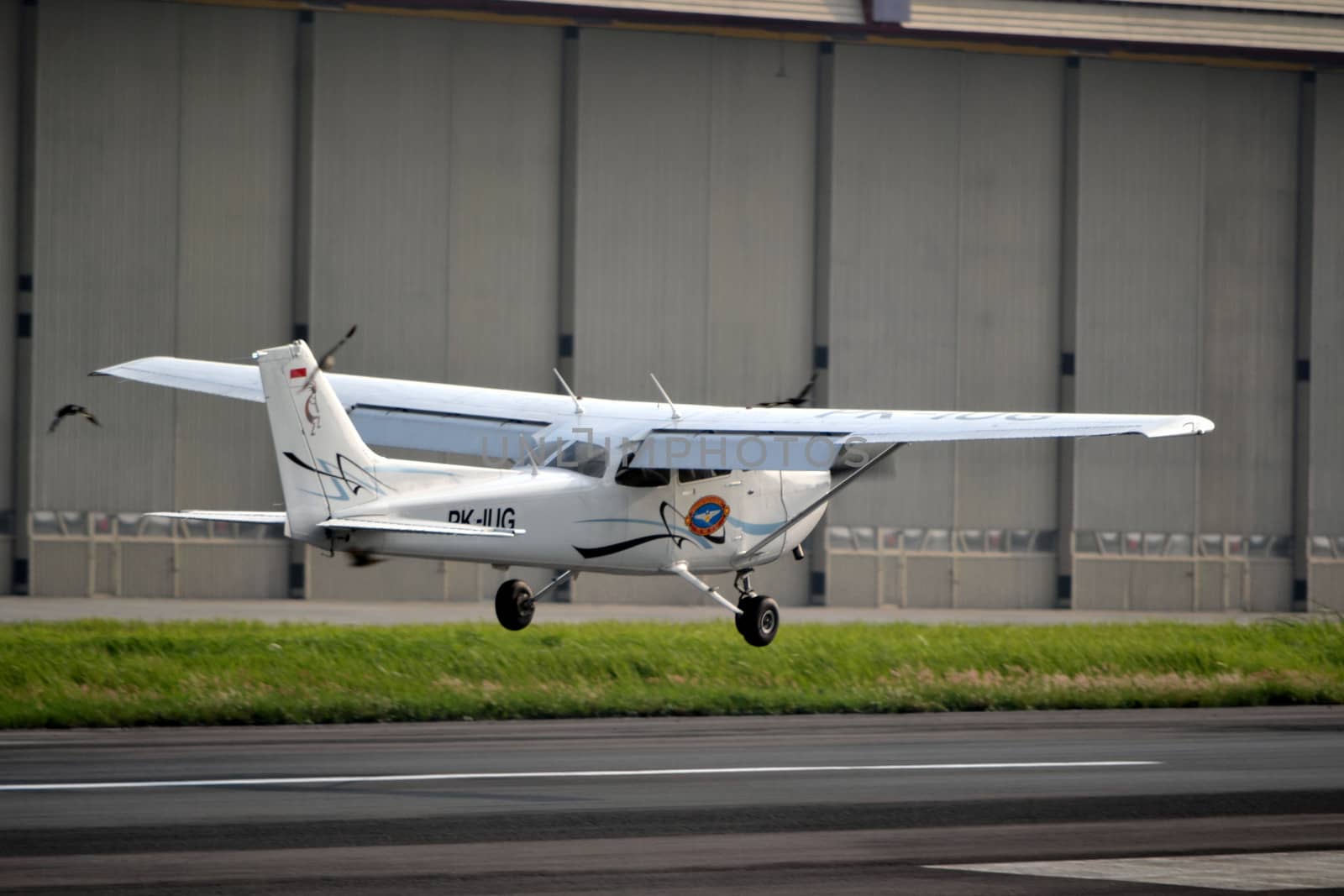 bandung, indonesia-june 16, 2014: Cesna airplane taking manoeuvre on husein sastranegara airport bandung.