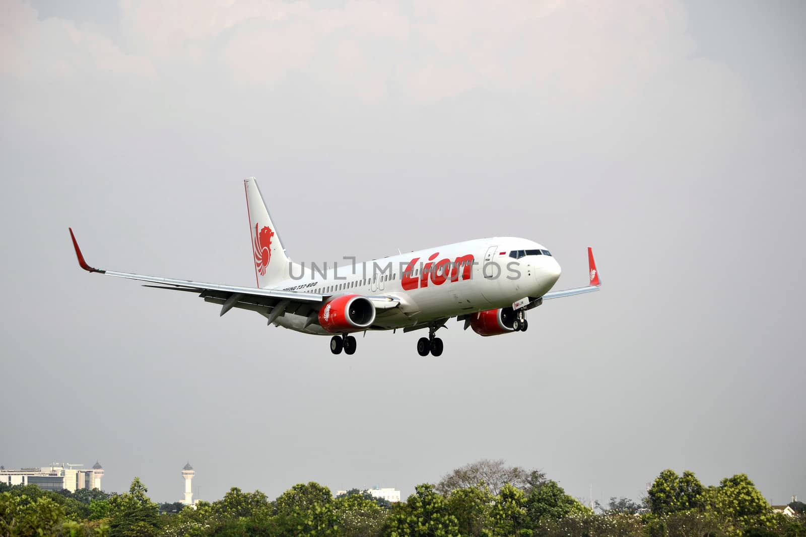bandung, indonesia-june 16, 2014: Lion Air airplane taking manoeuvre on husein sastranegara airport bandung.